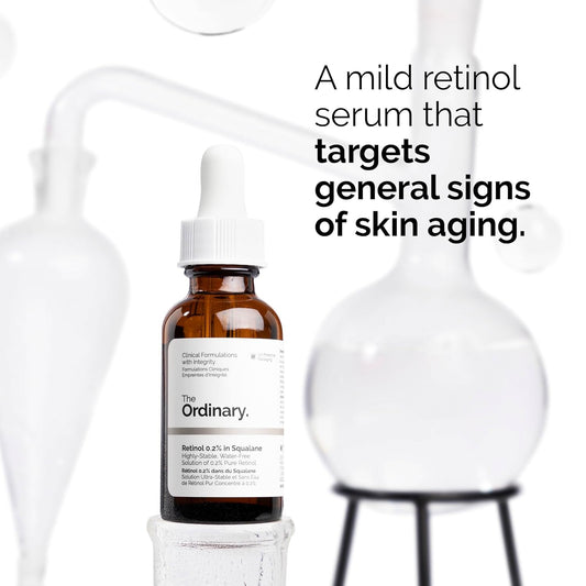 The Ordinary Retinol 0.2% in Squalane serum bottle displayed in a laboratory-inspired setting. The image highlights this gentle retinol formula designed to target early signs of skin aging, improve skin texture, smooth fine lines, and support a more youthful, radiant complexion while maintaining hydration with squalane.