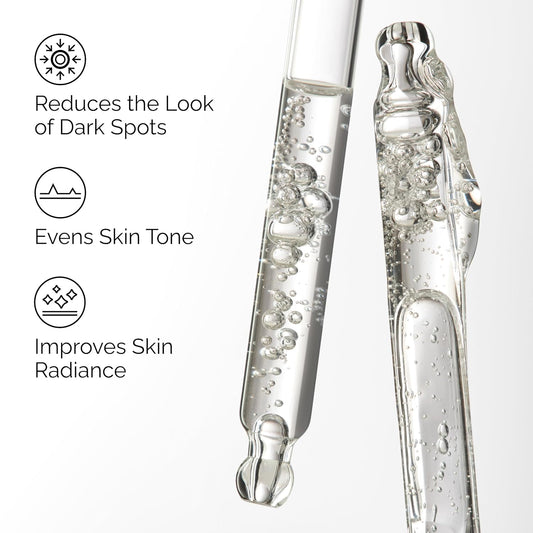 Close-up of The Ordinary Alpha Arbutin 2% + Hyaluronic Acid serum texture in glass droppers, highlighting key benefits: reduces the appearance of dark spots, evens skin tone, and improves skin radiance for a brighter, more even complexion.