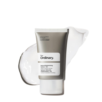The Ordinary Natural Moisturizing Factors + Hyaluronic Acid (NMF + HA) moisturizer tube displayed with a cream texture swatch in the background. Lightweight daily face moisturizer formulated to provide long-lasting hydration, strengthen the skin barrier, and support healthy, smooth, and moisturized skin. Suitable for all skin types and daily skincare routines.