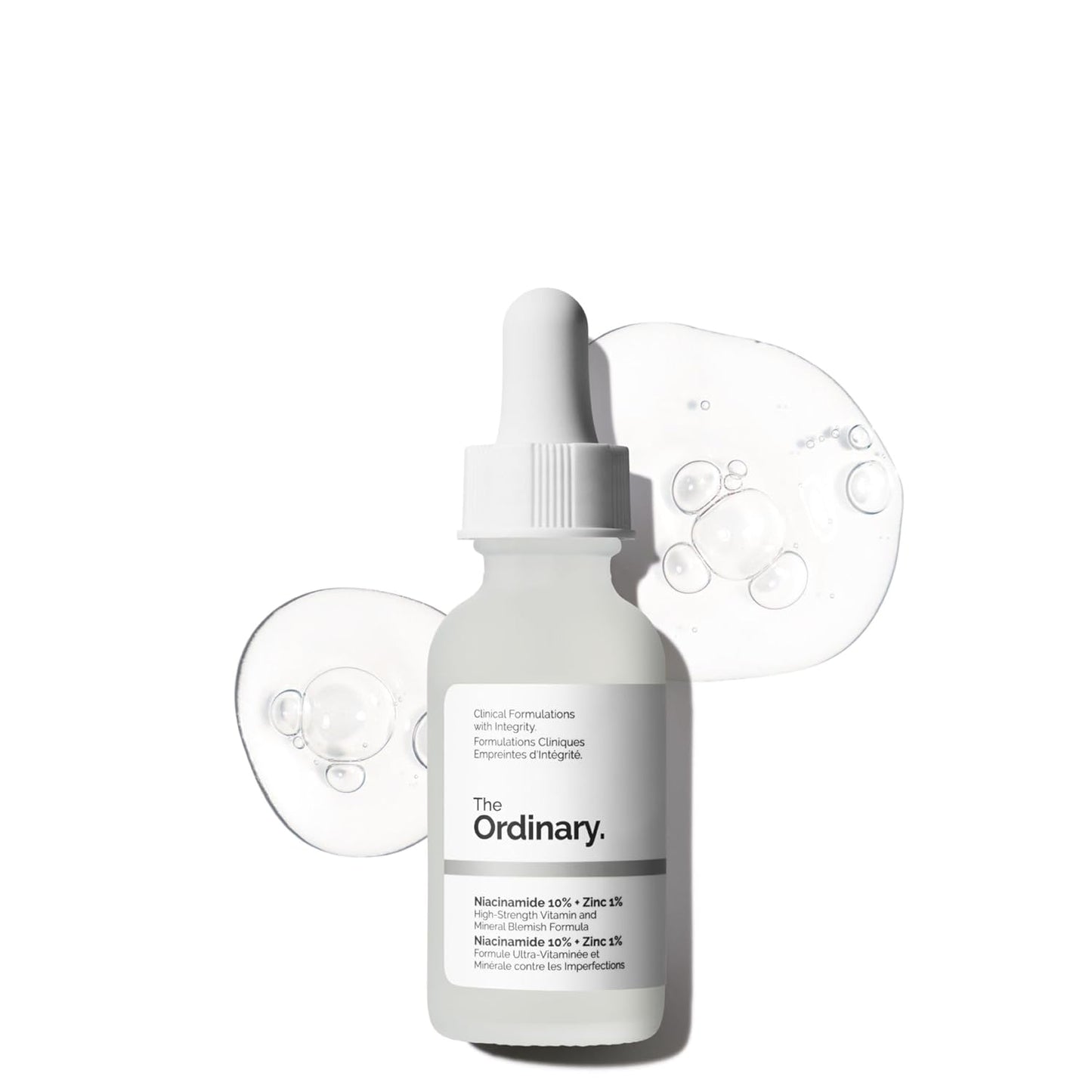 Skincare serum bottle with dropper labeled 'The Ordinary' on a white background