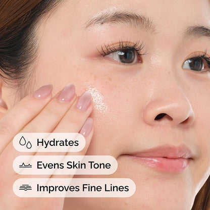 Close-up of a woman with smooth, radiant skin applying The Ordinary Retinol 0.2% in Squalane serum to her cheek. The image highlights key benefits including hydration, improved skin tone, and reduced appearance of fine lines. Suitable for beginners seeking gentle anti-aging and skin-smoothing results.