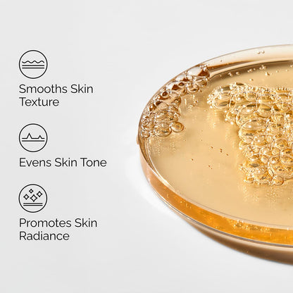 Benefit-focused graphic for The Ordinary Lactic Acid 5% + HA serum featuring a close-up of the golden serum texture. Highlights key skincare benefits including smoothing skin texture, evening skin tone, and promoting a brighter, more radiant complexion through gentle exfoliation. Ideal for improving dull, uneven-looking skin.