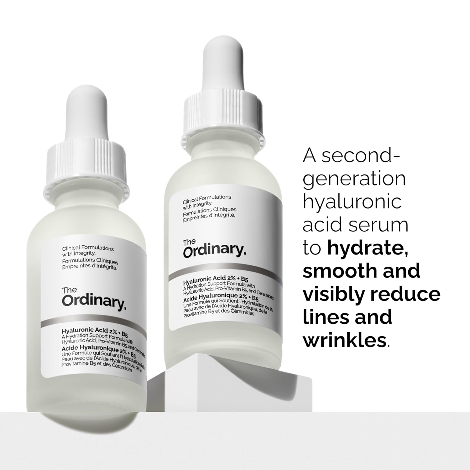 Two bottles of The Ordinary Hyaluronic Acid 2% + B5 serum displayed on a minimalist white background, highlighting advanced hydration, skin smoothing, and the reduction of visible fine lines and wrinkles for healthier-looking skin.