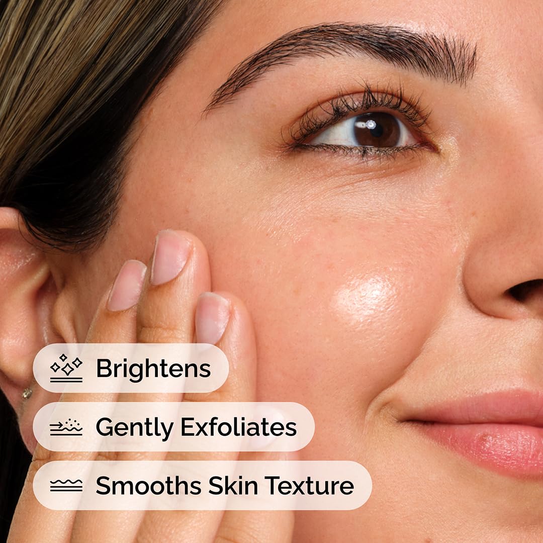 Close-up image of a woman applying The Ordinary Lactic Acid 5% + HA serum to her cheek. The graphic highlights key benefits including brightening dull skin, gently exfoliating dead skin cells, and smoothing uneven skin texture. Ideal for achieving a radiant, softer, and more refined complexion.