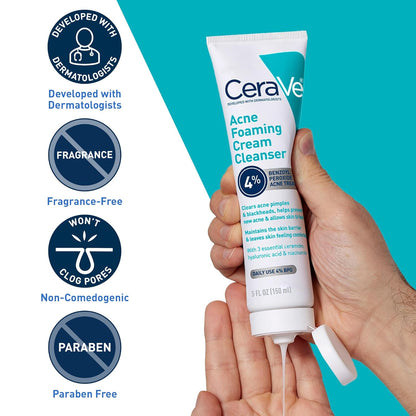 CeraVe Acne Foaming Cream Cleanser tube held in a hand with product features displayed.