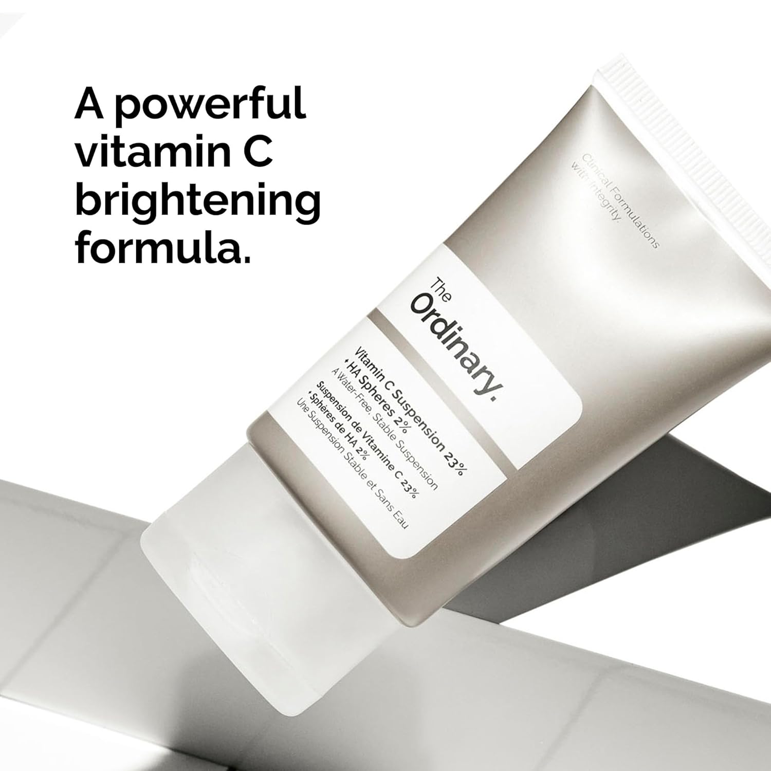 The Ordinary Vitamin C Suspension 23% + Hyaluronic Acid Spheres 2% displayed with the message "A Powerful Vitamin C Brightening Formula," highlighting its skin-brightening, antioxidant, and uneven skin tone correcting benefits.