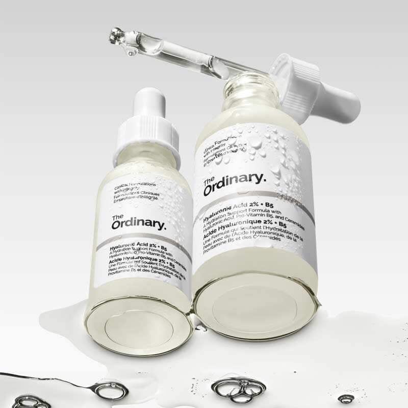 Two skincare bottles labeled 'The Ordinary' on a white background