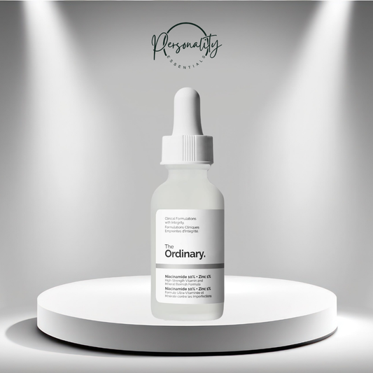 The Ordinary skincare serum bottle on a white platform with a gray background