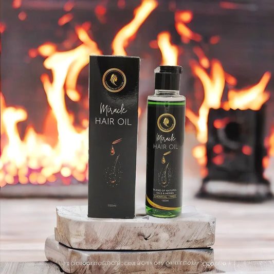 Miracle Hair Oil packaging with a bottle on a wooden stand against a fireplace background