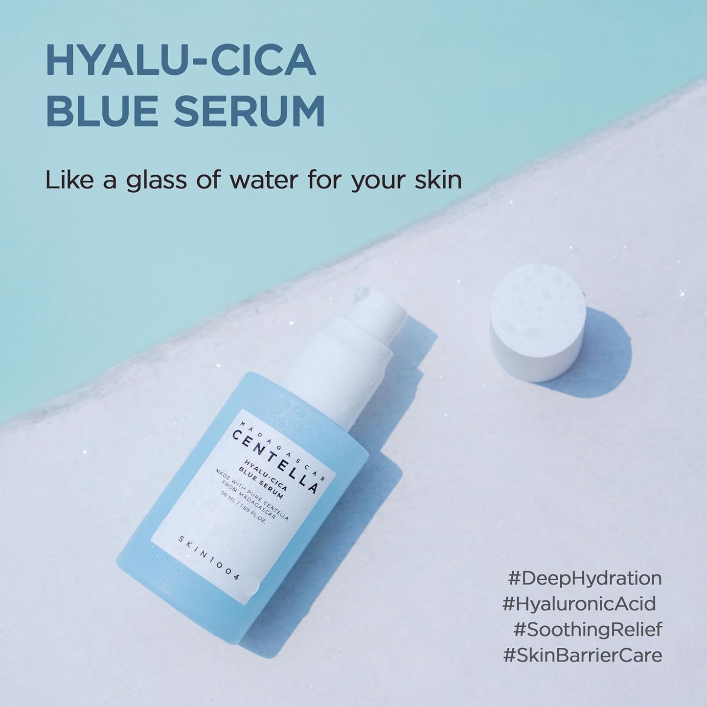 SKIN1004 Madagascar Centella Hyalu-Cica Blue Serum displayed on a blue background, highlighting deep hydration, hyaluronic acid, soothing care, and skin barrier support for healthy, moisturized skin.