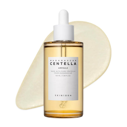 SKIN1004 Madagascar Centella Ampoule 100ml facial serum bottle with dropper, featuring pure Madagascar Centella Asiatica extract for soothing, hydrating, calming redness, strengthening the skin barrier, and promoting a healthy radiant glow.