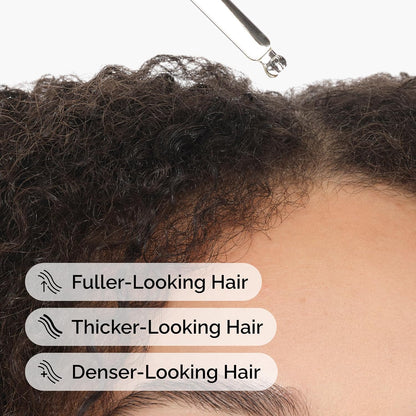 Person applying The Ordinary Multi-Peptide Serum for Hair Density to the scalp with a dropper to promote fuller, thicker, and denser-looking hair.