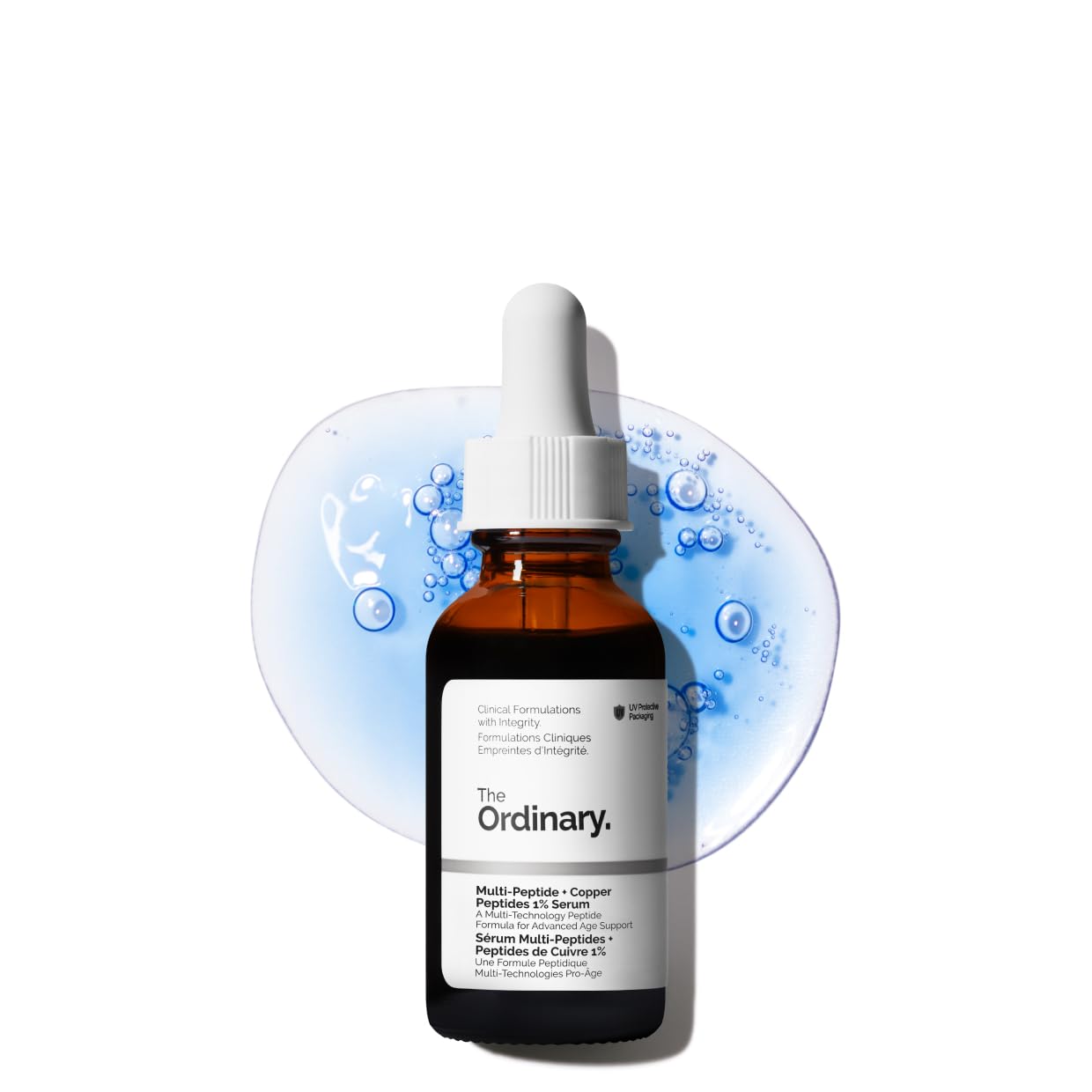 The Ordinary Multi-Peptide + Copper Peptides 1% Serum bottle with blue peptide serum texture in the background. Advanced anti-aging face serum formulated with GHK-Cu copper peptides to reduce fine lines, improve skin firmness, boost elasticity, strengthen the skin barrier, and promote a smoother, youthful-looking complexion.